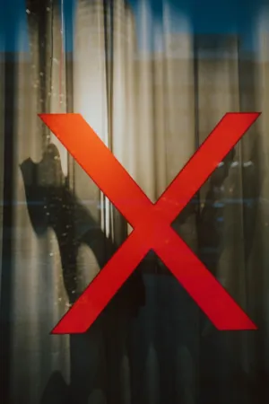 Red X Symbol On Glass