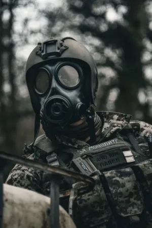 Military Soldier In Gas Mask