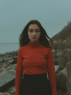 Red Turtleneck On The Beach