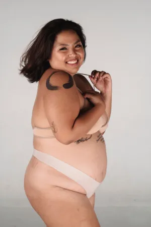 Plus Size Model In Nude Lingerie