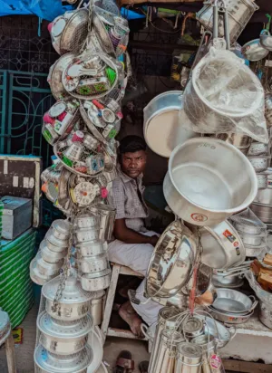 Market Vendor With Kitchenware