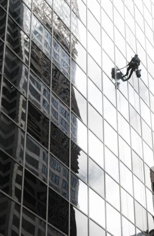 Reflection Of A Skyscraper In A Glass Building