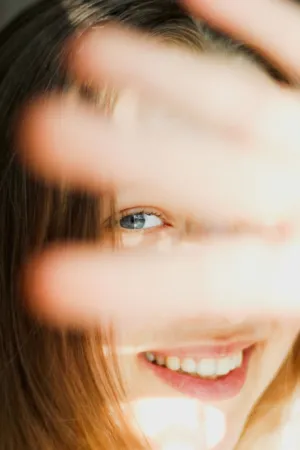 Hand Covering Face