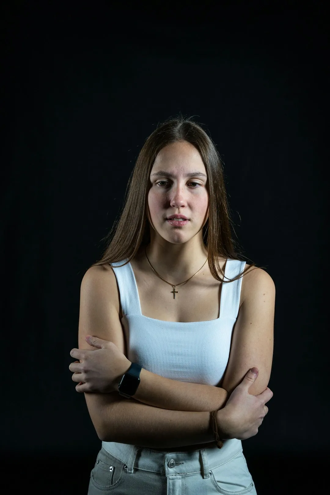 Young Woman In White Top