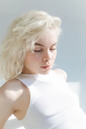 Blond Model In White Top