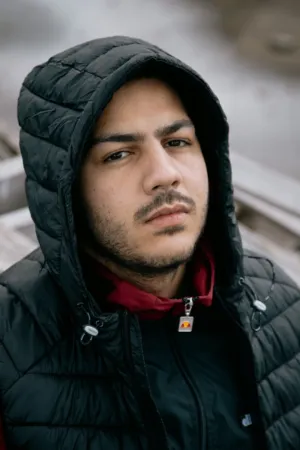 Young Man In Puffer Jacket