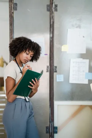Young Woman With Green Folder