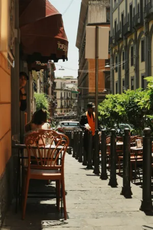 Narrow Street With Outdoor Cafe