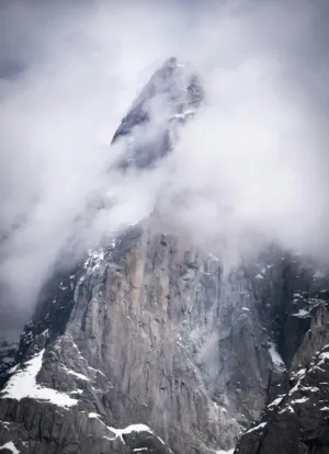 Mountain Peak In Clouds