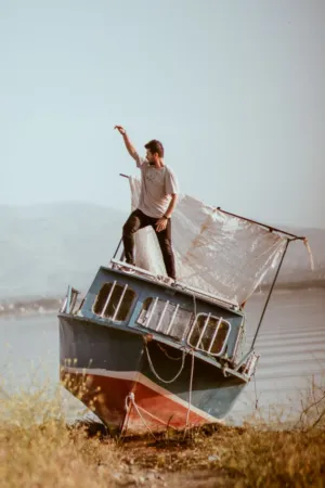 Man On Abandoned Boat