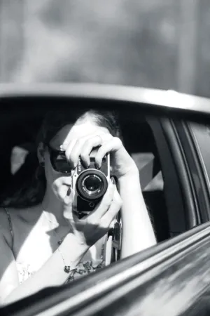 Photographer In Car