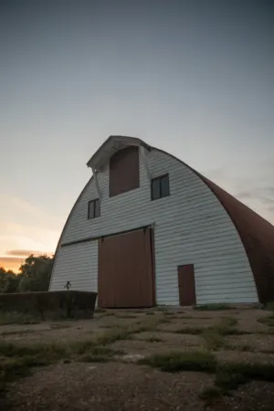 Agricultural Barn At Sunset
