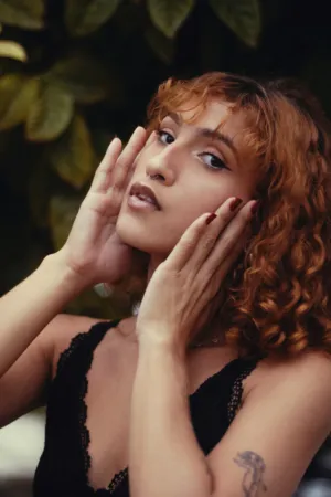 Portrait Of A Woman With Curly Hair