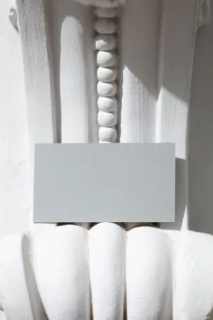 White Architectural Detail With Blank Card
