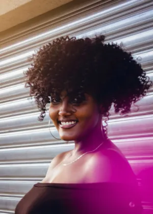 Smiling Woman With Curly Hair