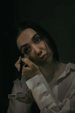Portrait Of A Woman Applying Makeup
