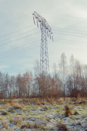 Electrical Pylon In Winter Landscape