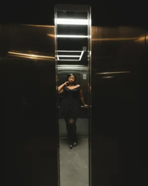 Elegant Woman In Elevator