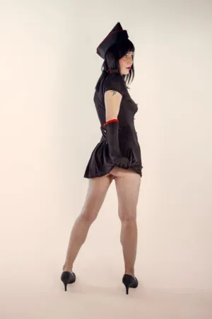 Female Model In Black Nurse Costume
