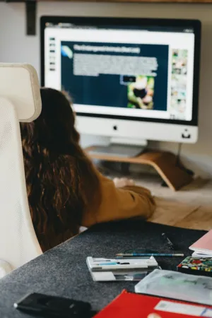 Person Studying At A Desk