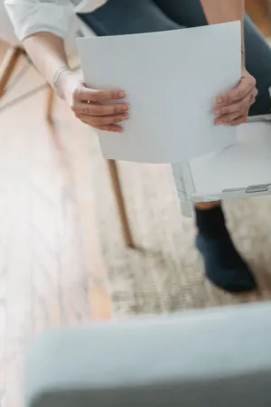 Person Holding Paper