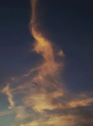Paraglider In The Sky