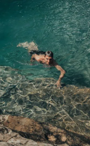 Swimmer In Turquoise Waters