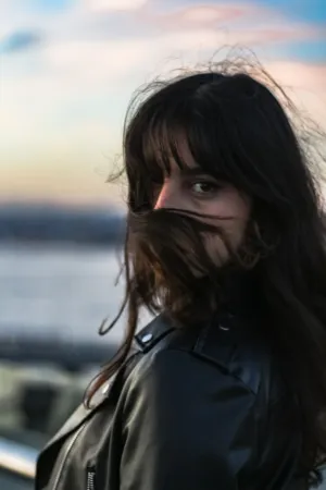 Portrait Of A Woman With Windblown Hair
