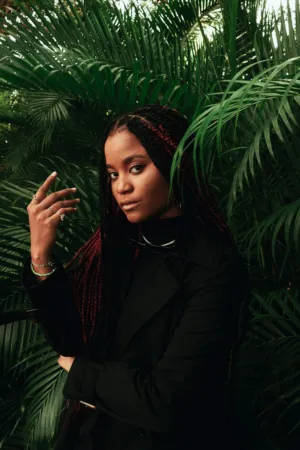 Portrait Of A Woman With Braids