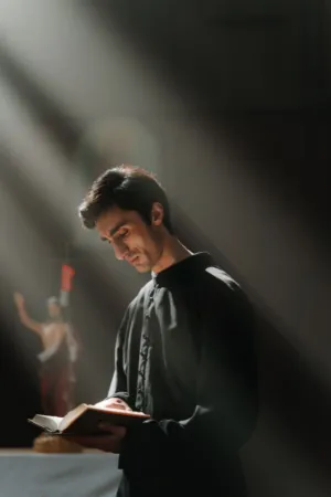 Priest Reading Bible