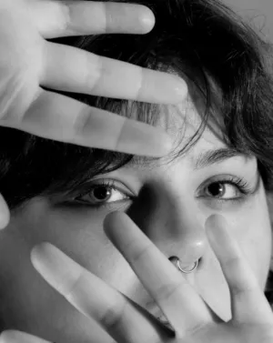Hand Covering Face