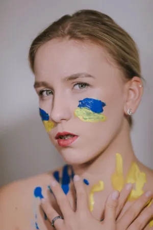 Portrait Of A Woman With Painted Face
