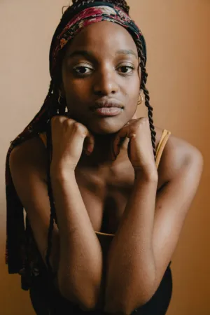 Portrait Of A Woman With Braids