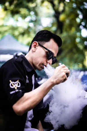 Man With Sunglasses Vaping