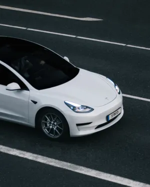 White Tesla Model 3 On The Road