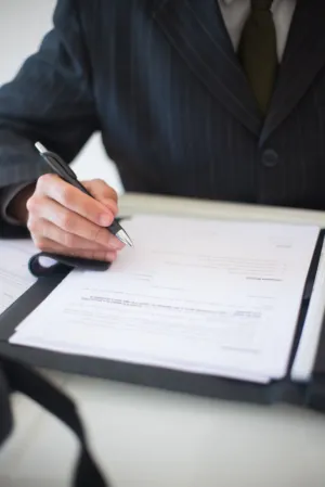 Businessman Signing Document