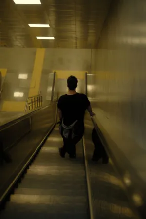 Man On Escalator