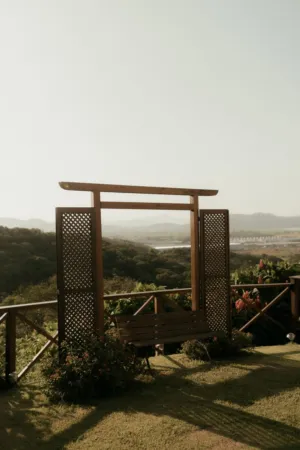 Wooden Swing With Lattice Panels