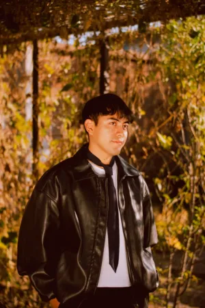 Leather Jacket And Tie Outdoors