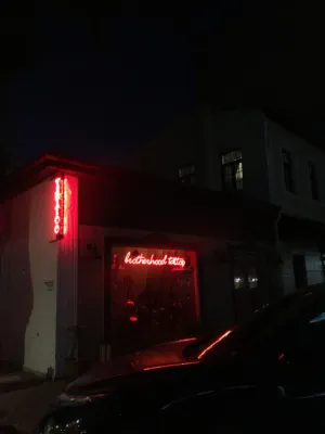 Brotherhood Tattoo Shop At Night