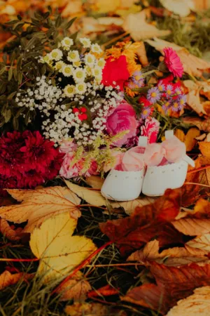 Baby Shoes And Flowers