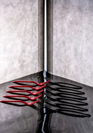 Red Forks On Black Surface