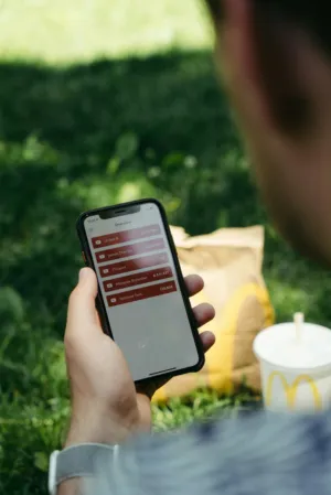 Person Checking Youtube Subscriptions