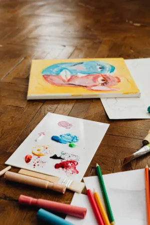 Art Supplies On Wooden Floor