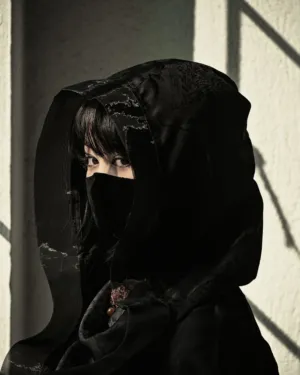 Black Hooded Figure