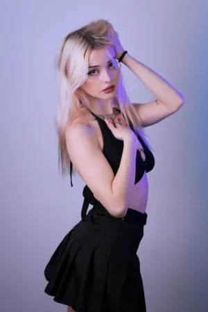 Blonde Model In Black Outfit