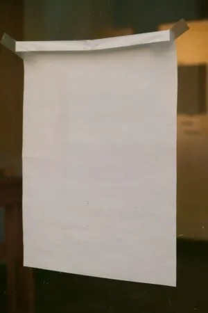 Blank Paper On Glass Window