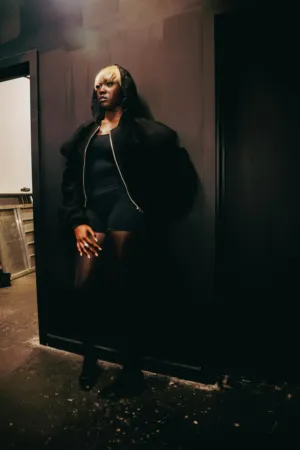Fashionable Figure In Dark Setting
