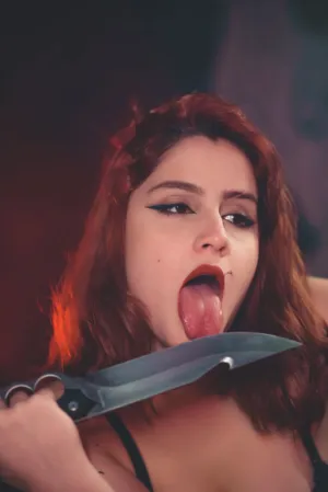 Redhead With Knife