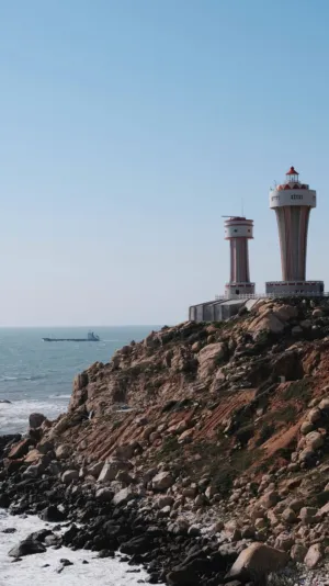 Lighthouse On Rocky Coast